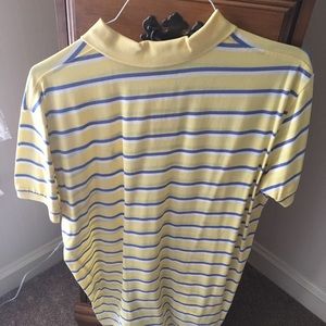 Short sleeve Polo shirt. Excellent condition.